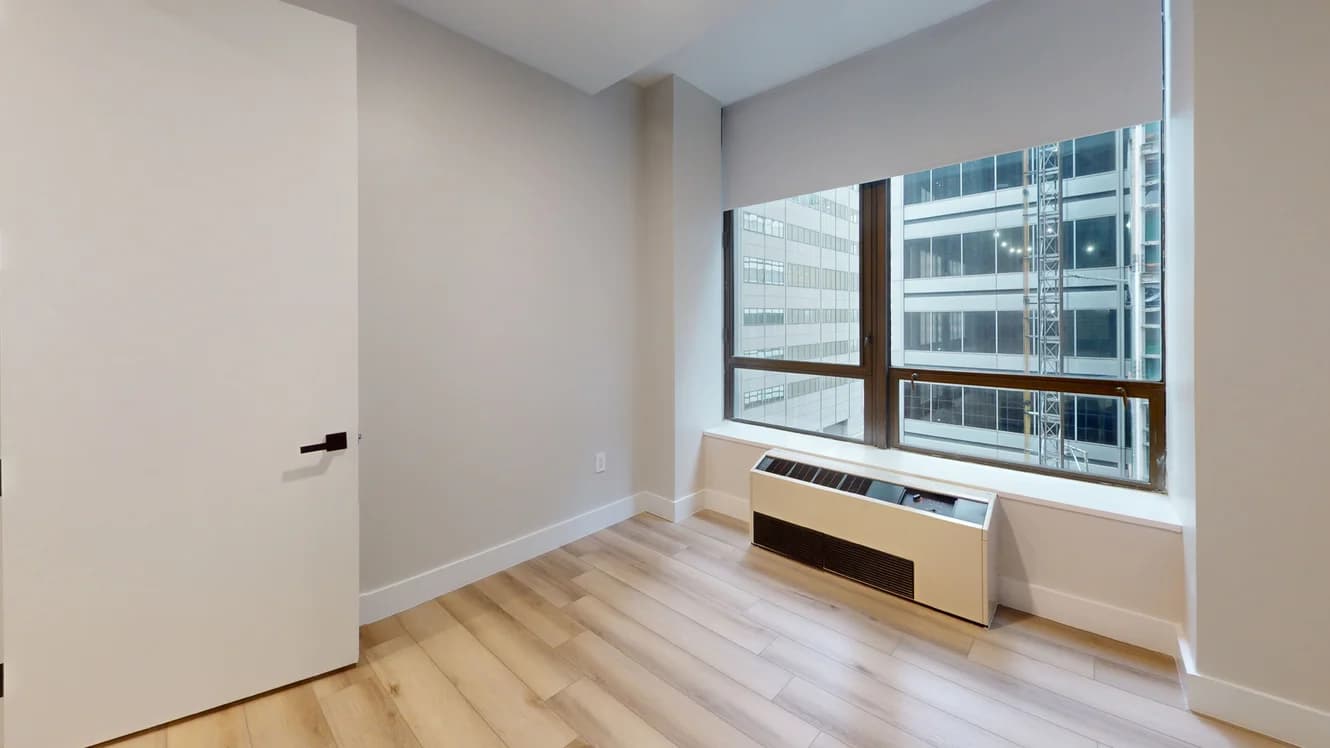 95 Wall St. in Financial District 95 Wall Street #907, Manhattan, NY 10005 apartment_bedroom_room 1