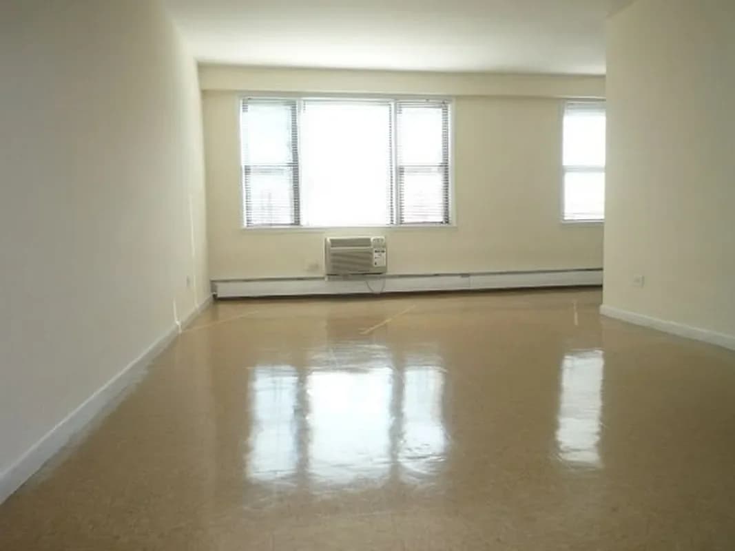 97-30 57 Avenue #UNI18N, Queens, NY 11368 apartment_living_room 1