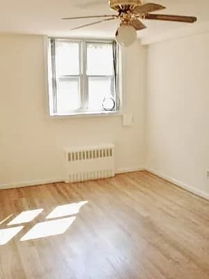 18-24 21 Avenue #1F, Queens, NY 11105 apartment_living_room 1