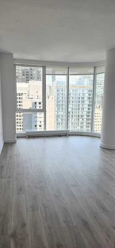 ARO 242 West 53 Street #34E, Manhattan, NY 10019 apartment_living_room 1